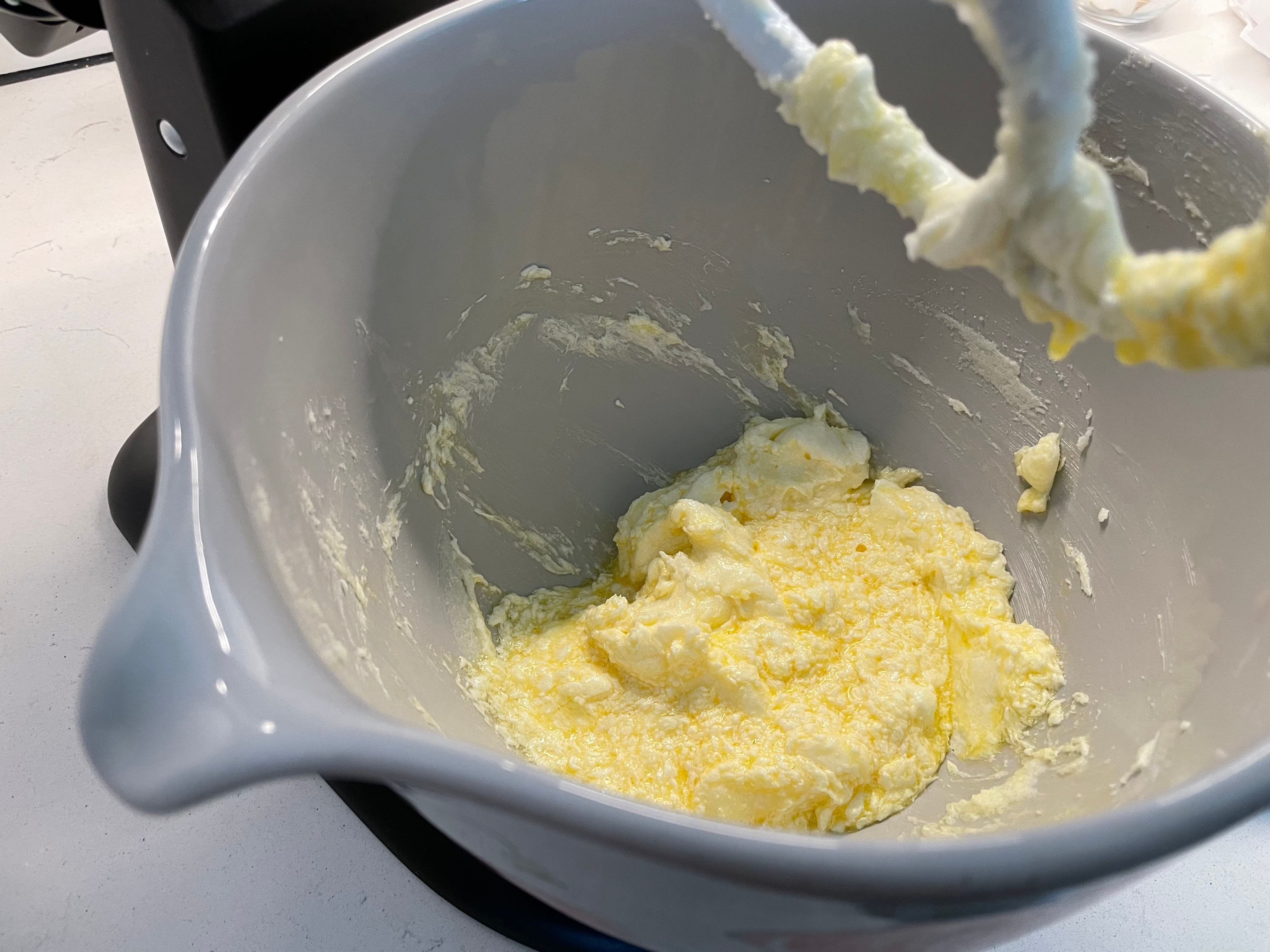 Under mixing after adding an egg makes the batter look scrambled. Keep mixing.