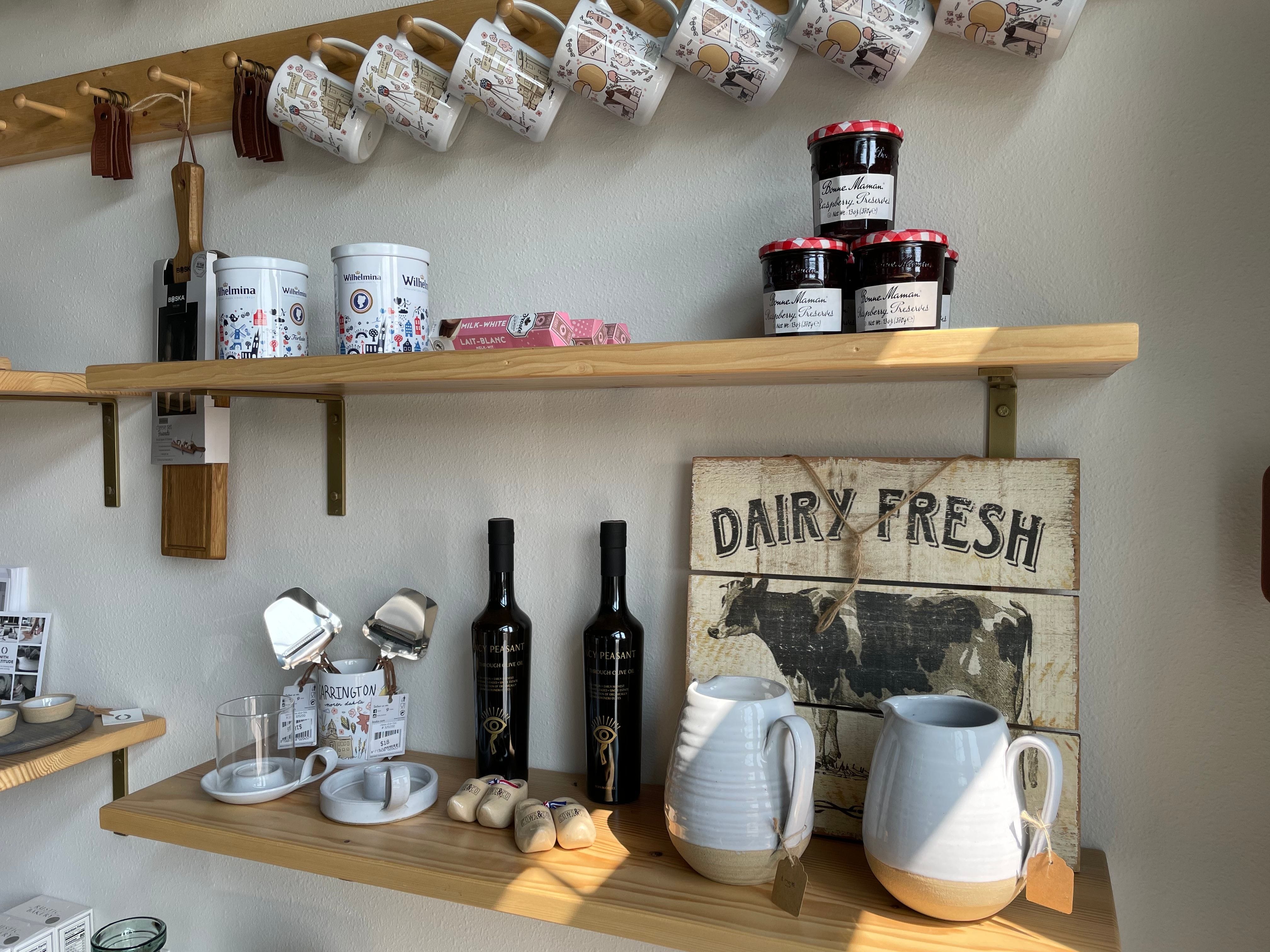 Shelf displaying goods for sale at the creamery.