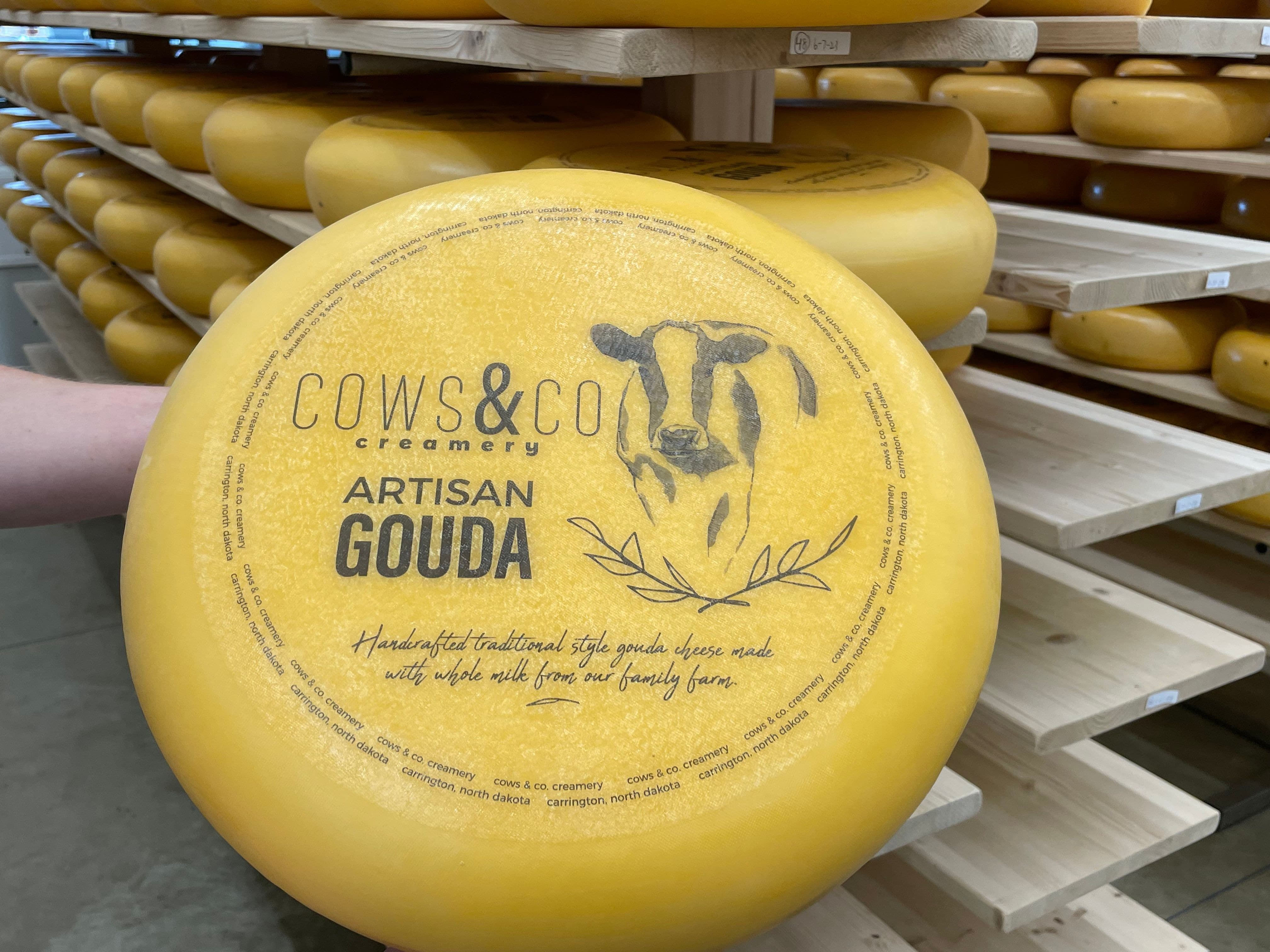 The gouda is left on wooden shelves to age. 