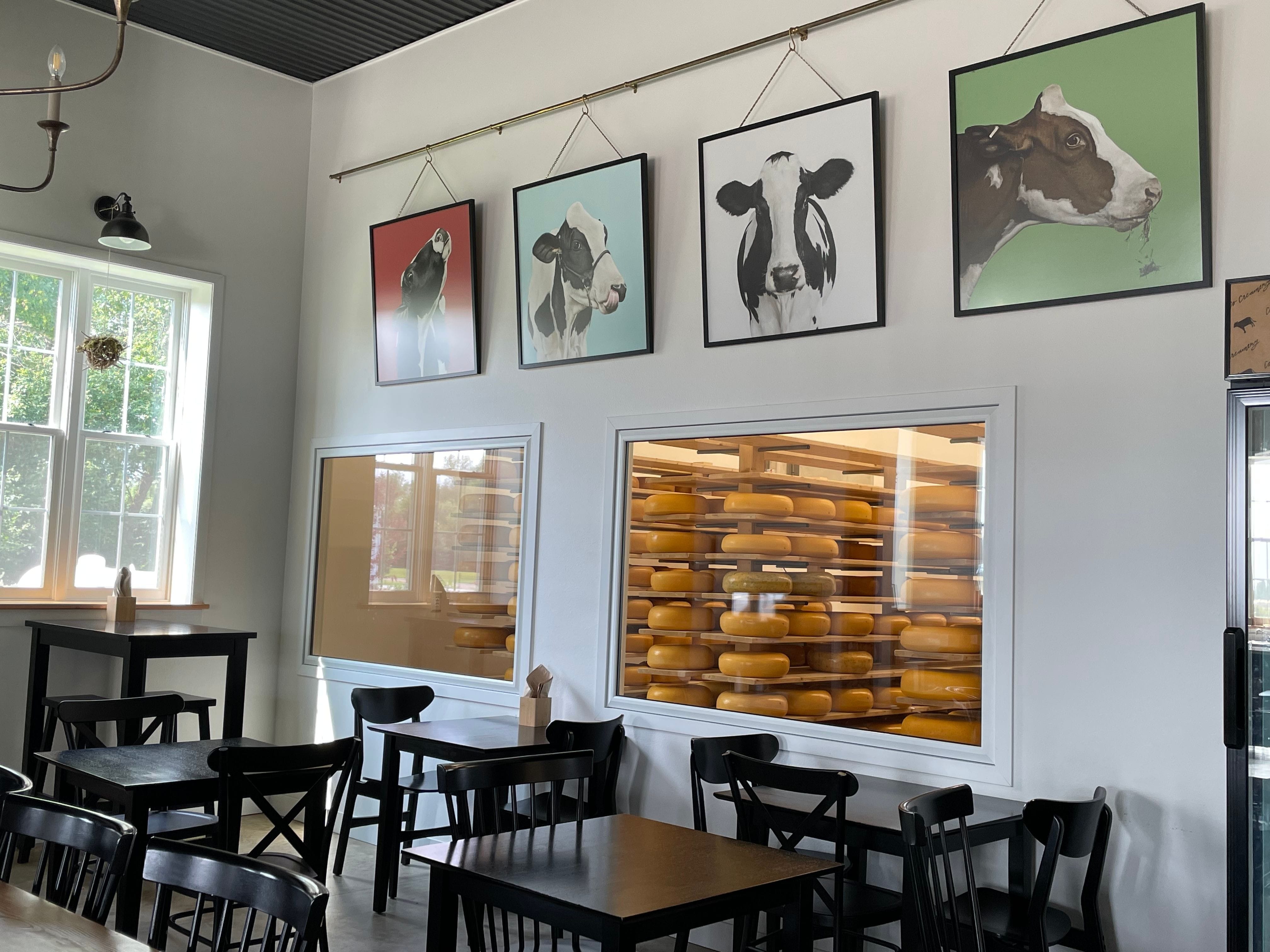 Creamery dining room with a view of the cheese aging room.